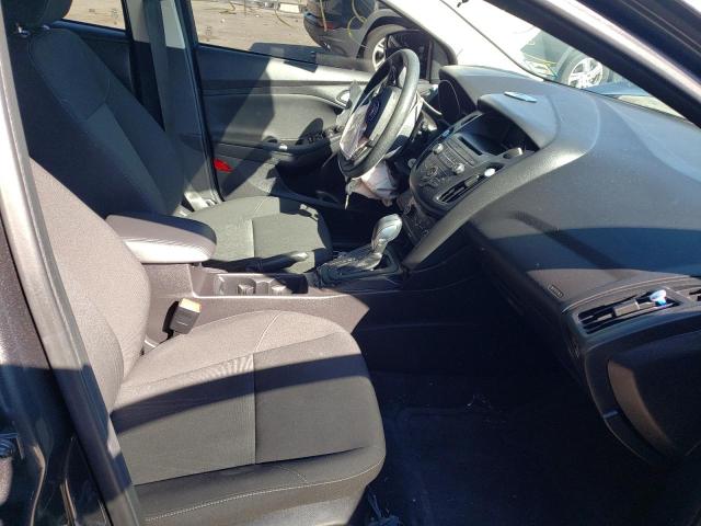 Foto 5 de la subasta – 2015 FORD FOCUS SE con VIN 1FADP3K20FL214108
