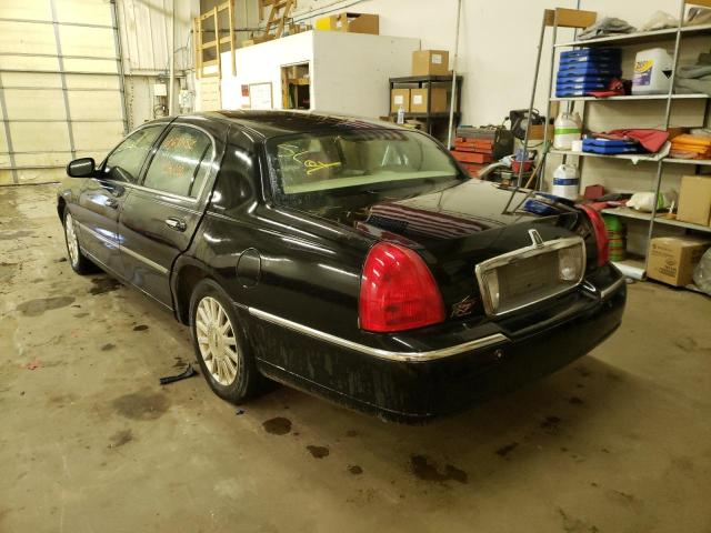 Photo 3 from auction – 2004 LINCOLN TOWN CAR E with VIN 1LNHM81W44Y623794