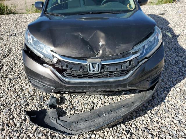 Photo 9 from auction – 2015 HONDA CR-V LX with VIN 2HKRM4H37FH682355