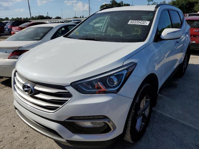 Photo 2 from auction – 2018 HYUNDAI SANTA FE S with VIN 5NMZU3LB0JH055978