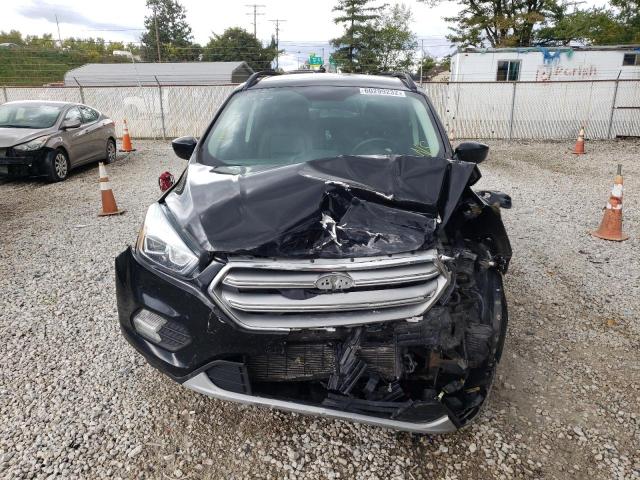 Photo 9 from auction – 2017 FORD ESCAPE SE with VIN 1FMCU9GDXHUD19128