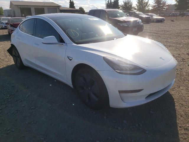 TESLA MODEL 3 2018 with VIN 5YJ3E1EB9JF096647 - Photo from auction