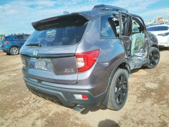Photo 4 from auction – 2021 HONDA PASSPORT E with VIN 5FNYF8H04MB020652