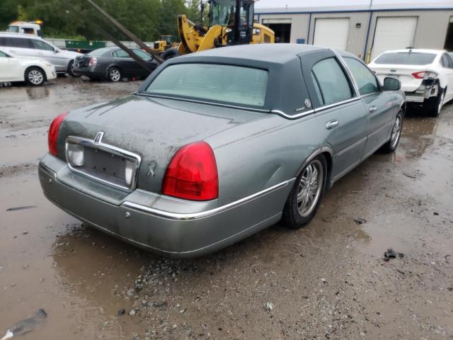 Photo 4 from auction – 2004 LINCOLN TOWN CAR with VIN 1LNHM83W74Y685641