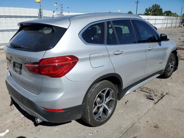 Photo 4 from auction – 2018 BMW X1 XDRIVE2 with VIN WBXHT3C35J5K31324