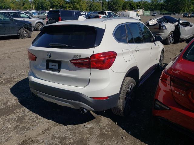 Photo 4 from auction – 2018 BMW X1 XDRIVE2 with VIN WBXHT3C37J5K23211