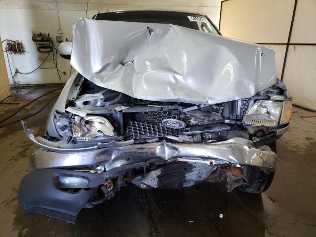 Photo 9 from auction – 2003 FORD F150 with VIN 1FTRX18L23NA29157