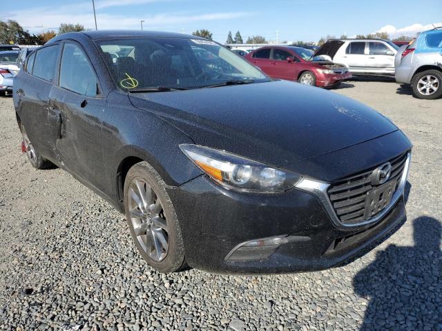 MAZDA 3 TOURING 2018 with VIN 3MZBN1V37JM183346 - Photo from auction