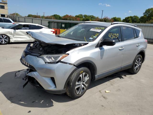 Photo 2 from auction – 2018 TOYOTA RAV4 LE with VIN JTMZFREV0JJ182535