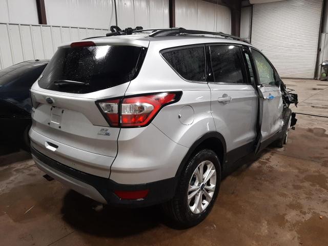 Photo 4 from auction – 2018 FORD ESCAPE SE with VIN 1FMCU9GD9JUA04987