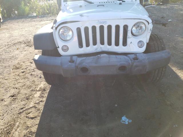 Photo 9 from auction – 2015 JEEP WRANGLER U with VIN 1C4BJWDG4FL744191