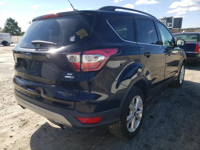 Photo 4 from auction – 2018 FORD ESCAPE SE with VIN 1FMCU9GD7JUA61382