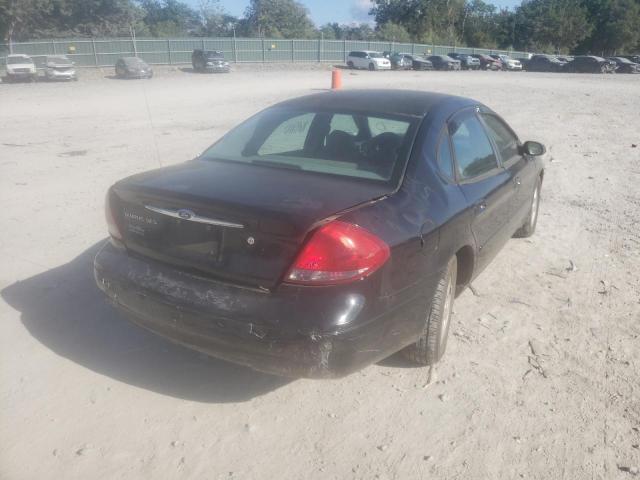 Photo 9 from auction – 2002 FORD TAURUS SES with VIN 1FAFP55U82A140928