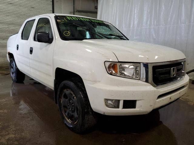 HONDA RIDGELINE 2011 with VIN 5FPYK1F20BB006128 - Photo from auction
