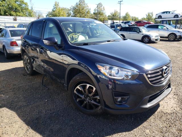 MAZDA CX-5 GT 2016 with VIN JM3KE4DY6G0668551 - Photo from auction
