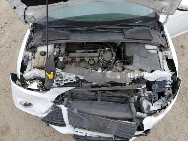 Foto 7 de la subasta – 2014 FORD FOCUS SE con VIN 1FADP3K23EL238384