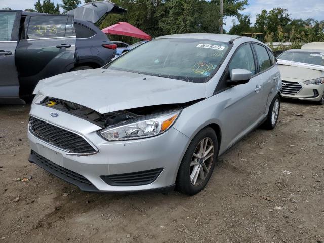 Photo 2 from auction – 2018 FORD FOCUS SE with VIN 1FADP3K29JL327046