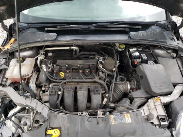 Foto 7 de la subasta – 2014 FORD FOCUS SE con VIN 1FADP3F29EL395914