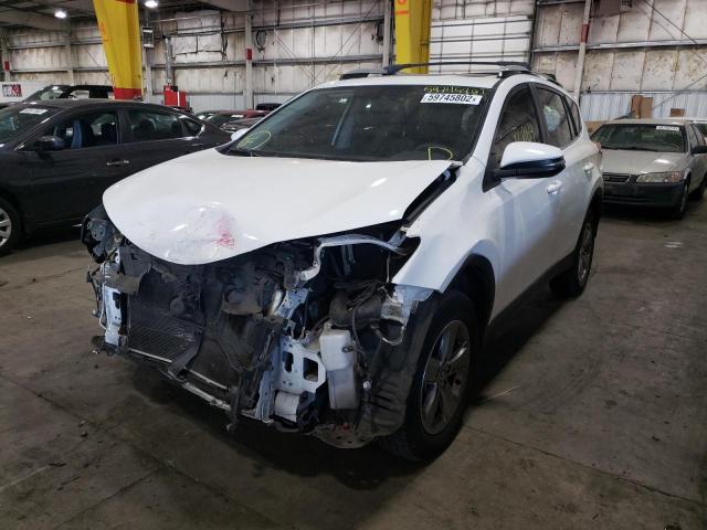 Photo 2 from auction – 2015 TOYOTA RAV4 XLE with VIN JTMRFREV0FD160640