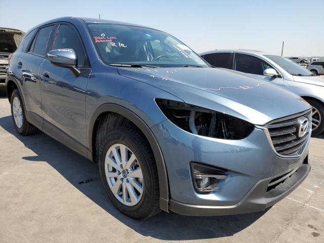 Photo 1 from auction – 2016 MAZDA CX-5 TOURI with VIN JM3KE2CY0G0819275