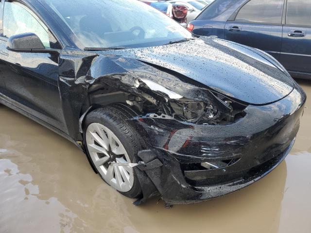 Photo 9 from auction – 2022 TESLA MODEL 3 with VIN 5YJ3E1EB5NF186951