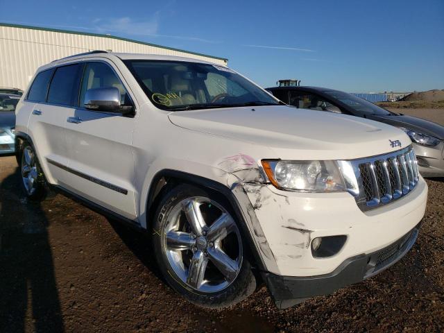 JEEP GRAND CHER 2011 with VIN 1J4RR6GG1BC641236 - Photo from auction