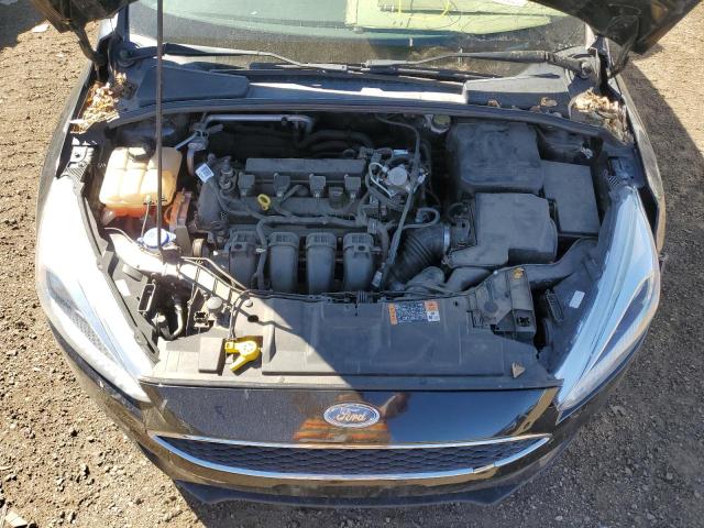 Photo 7 from auction – 2016 FORD FOCUS SE with VIN 1FADP3F22GL364653