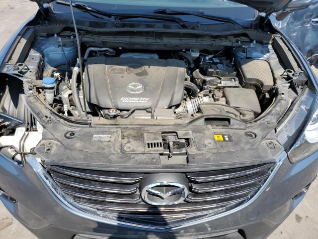 Photo 7 from auction – 2016 MAZDA CX-5 TOURI with VIN JM3KE2CY0G0819275