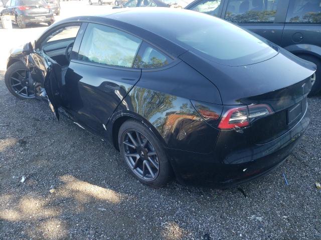 Photo 3 from auction – 2021 TESLA MODEL 3 with VIN 5YJ3E1EA8MF023555