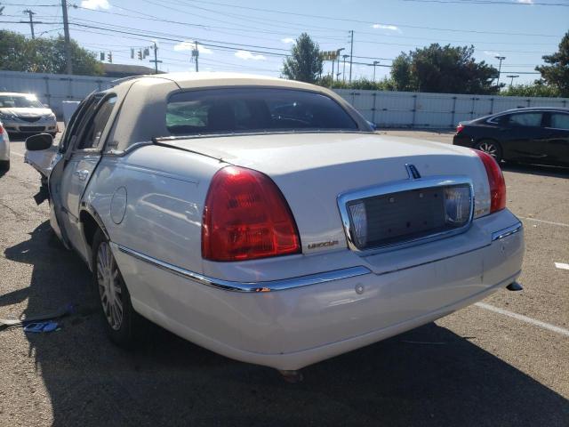 Photo 3 from auction – 2004 LINCOLN TOWN CAR E with VIN 1LNHM81W84Y667491