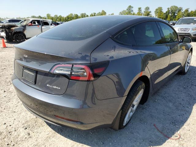 Photo 4 from auction – 2022 TESLA MODEL 3 with VIN 5YJ3E1EB1NF247910