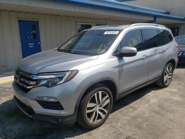 Photo 2 from auction – 2016 HONDA PILOT TOUR with VIN 5FNYF5H95GB031080