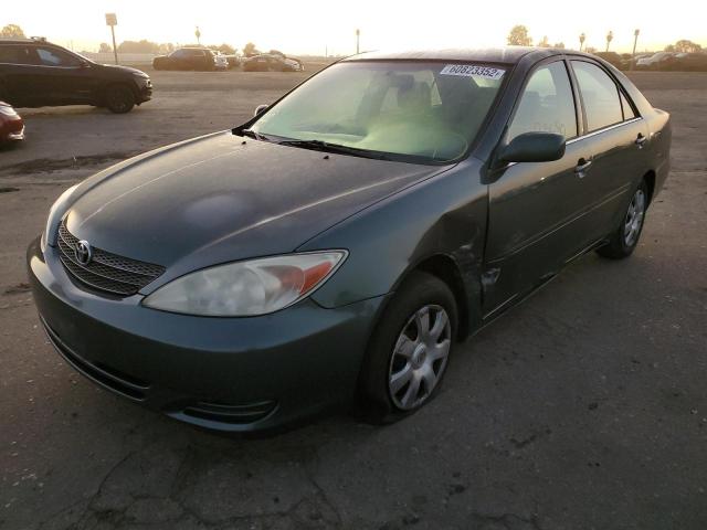 Photo 2 from auction – 2002 TOYOTA CAMRY LE with VIN JTDBE32K420117447