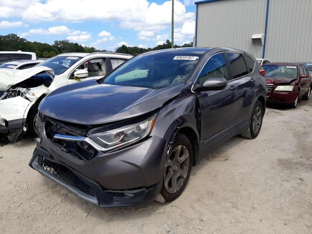Photo 2 from auction – 2017 HONDA CR-V EXL with VIN 7FARW1H8XHE028122