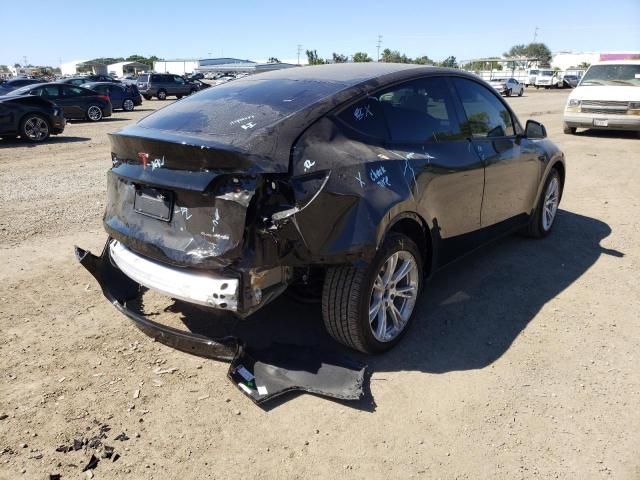 Photo 4 from auction – 2021 TESLA MODEL Y with VIN 5YJYGDEE4MF096524