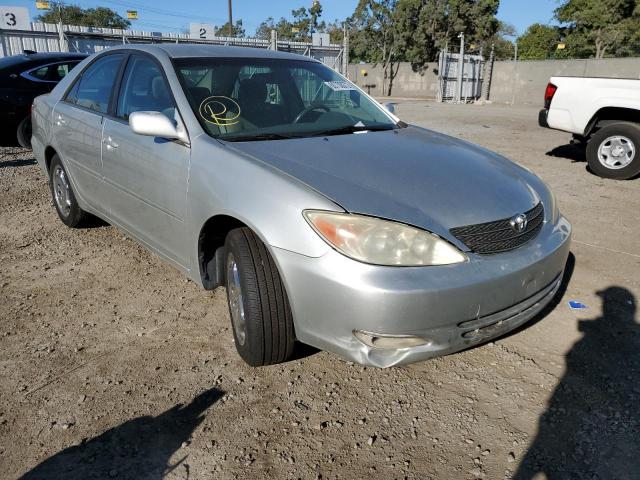TOYOTA CAMRY LE 2003 with VIN JTDBE32K030227168 - Photo from auction
