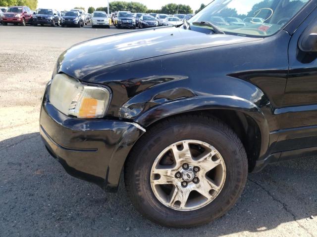 Photo 9 from auction – 2003 FORD ESCAPE LIM with VIN 1FMCU94173KC86281