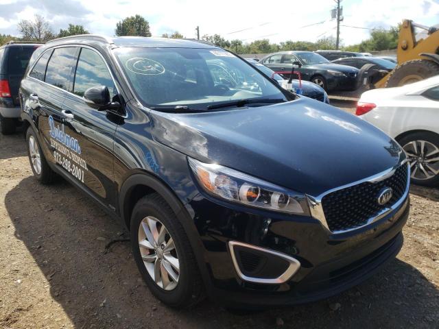 KIA SORENTO LX 2016 with VIN 5XYPGDA32GG165675 - Photo from auction