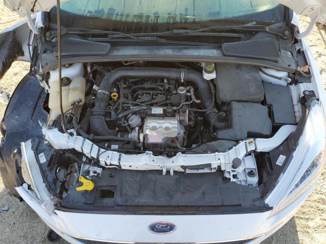 Photo 7 from auction – 2018 FORD FOCUS SE with VIN 1FADP3FE7JL308919