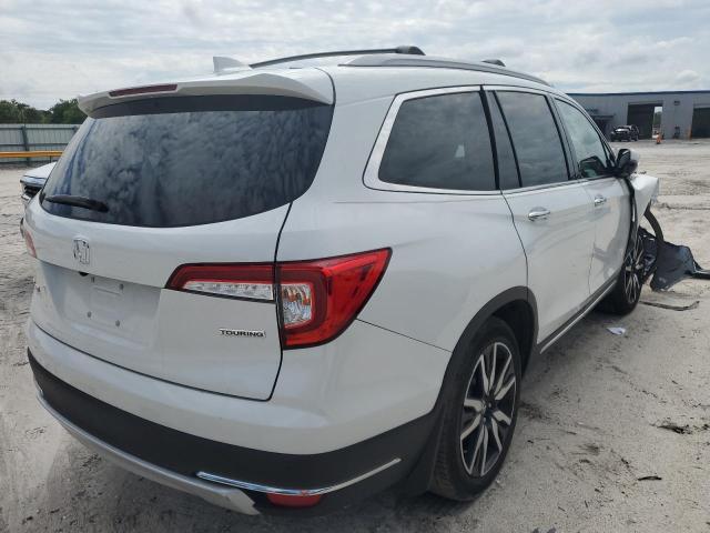 Photo 4 from auction – 2021 HONDA PILOT TOUR with VIN 5FNYF5H94MB021975