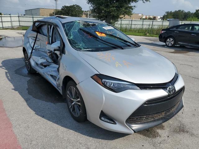 TOYOTA COROLLA L 2017 with VIN 5YFBURHE1HP678453 - Photo from auction