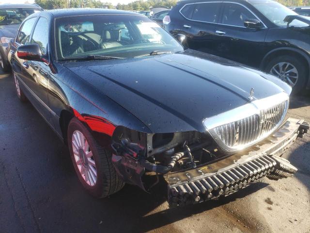 LINCOLN TOWN CAR E 2003 with VIN 1LNHM81W73Y660661 - Photo from auction