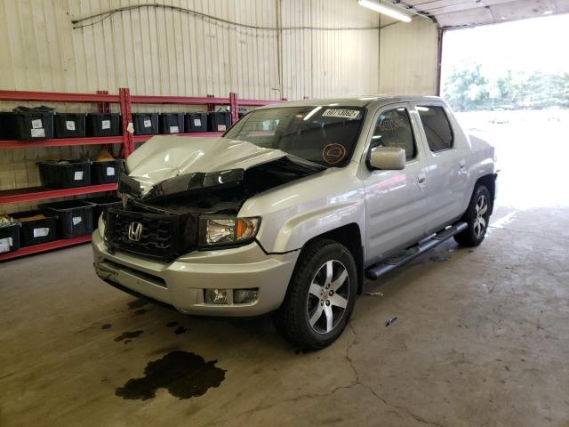 Photo 2 from auction – 2014 HONDA RIDGELINE with VIN 5FPYK1F69EB012470
