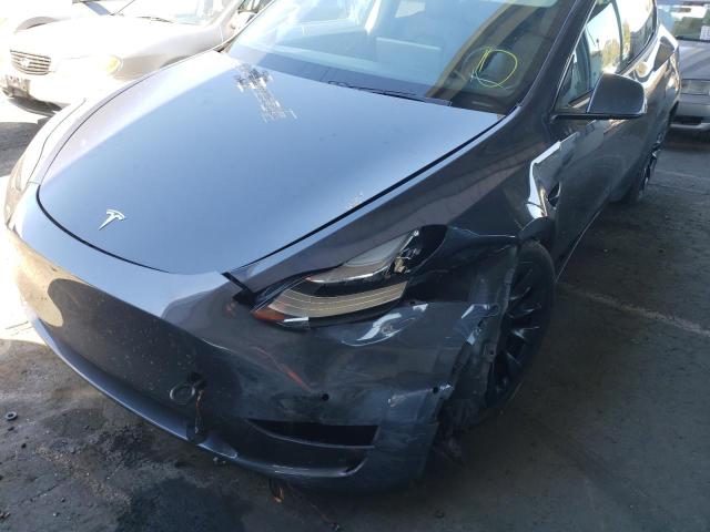 Photo 9 from auction – 2021 TESLA MODEL Y with VIN 5YJYGDEE7MF073772