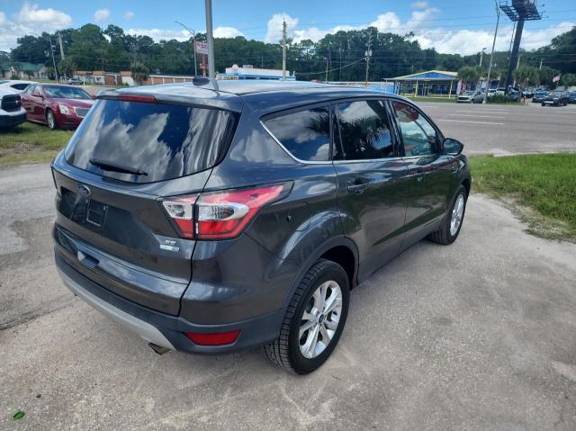 Photo 4 from auction – 2017 FORD ESCAPE SE with VIN 1FMCU9GD6HUB47731
