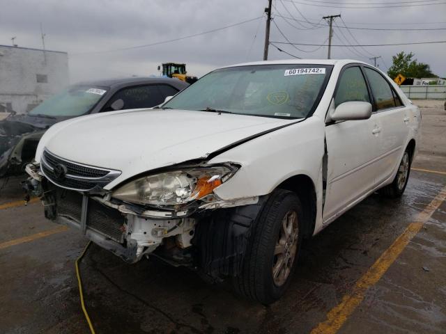 Photo 2 from auction – 2004 TOYOTA CAMRY LE with VIN JTDBE32K340266399
