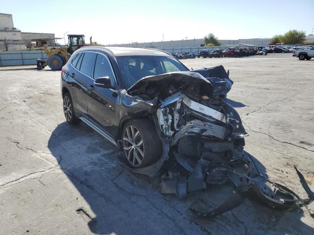 BMW X1 XDRIVE2 2017 with VIN WBXHT3C30H5F71090 - Photo from auction