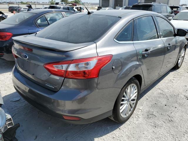 Photo 4 from auction – 2014 FORD FOCUS TITA with VIN 1FADP3J28EL310939