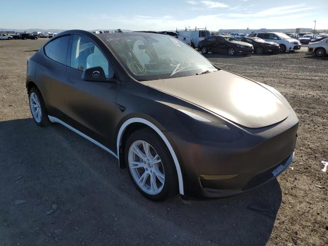 TESLA MODEL Y 2022 with VIN 7SAYGDEE5NF310148 - Photo from auction