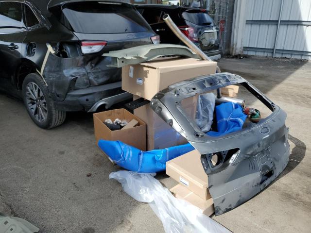 Photo 9 from auction – 2020 FORD ESCAPE TIT with VIN 1FMCU9DZ3LUC03102